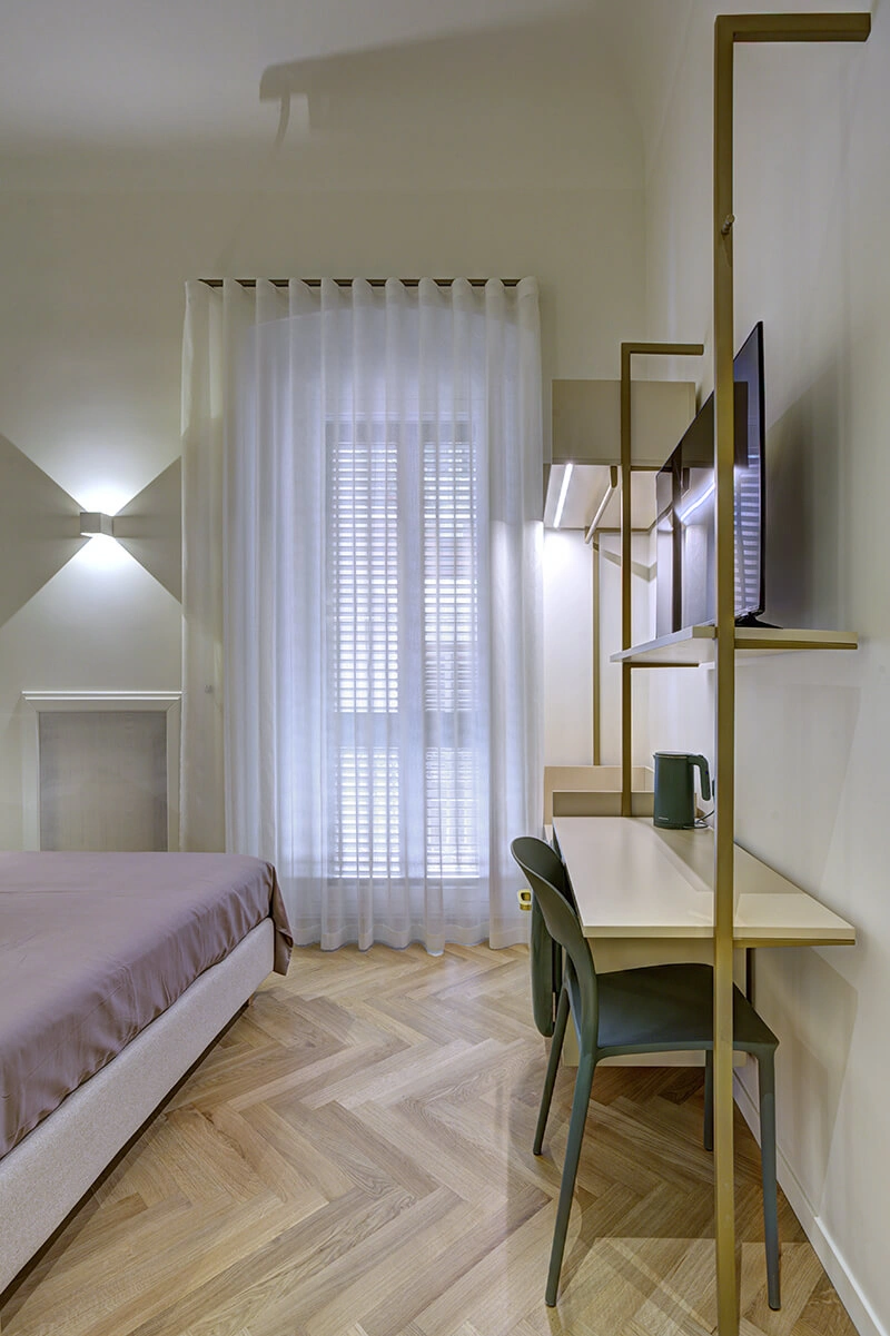Prospettiva dell'arredamento della Camera Salvia – B&B Barletta, ambiente accogliente.